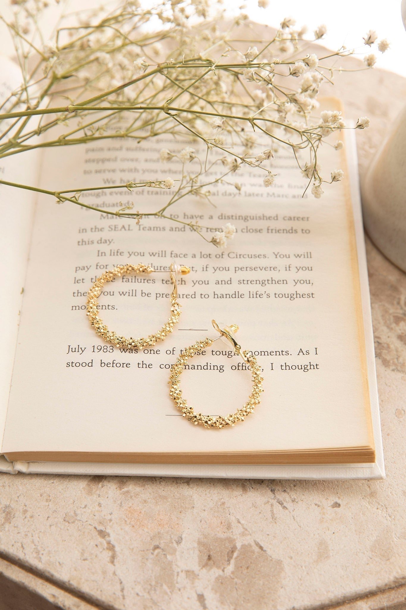 Layered Saturn texture earrings in gold