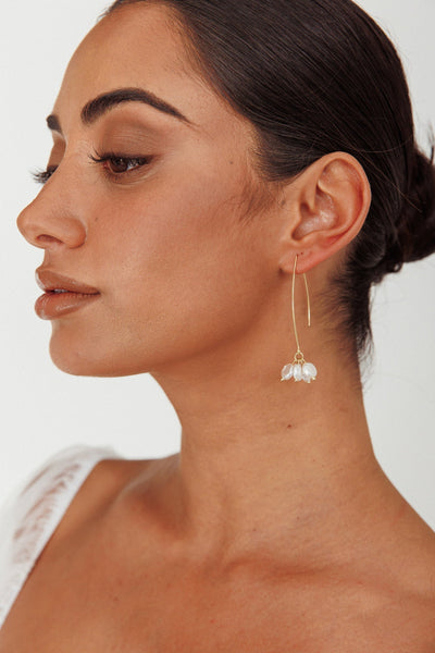 Long hook earrings with gold pearl accents