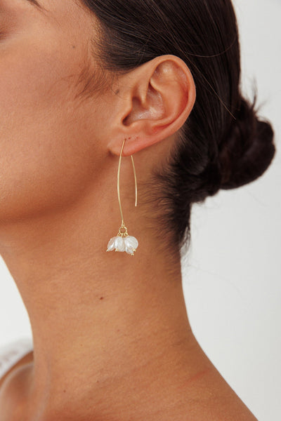 Long hook earrings with gold pearl accents