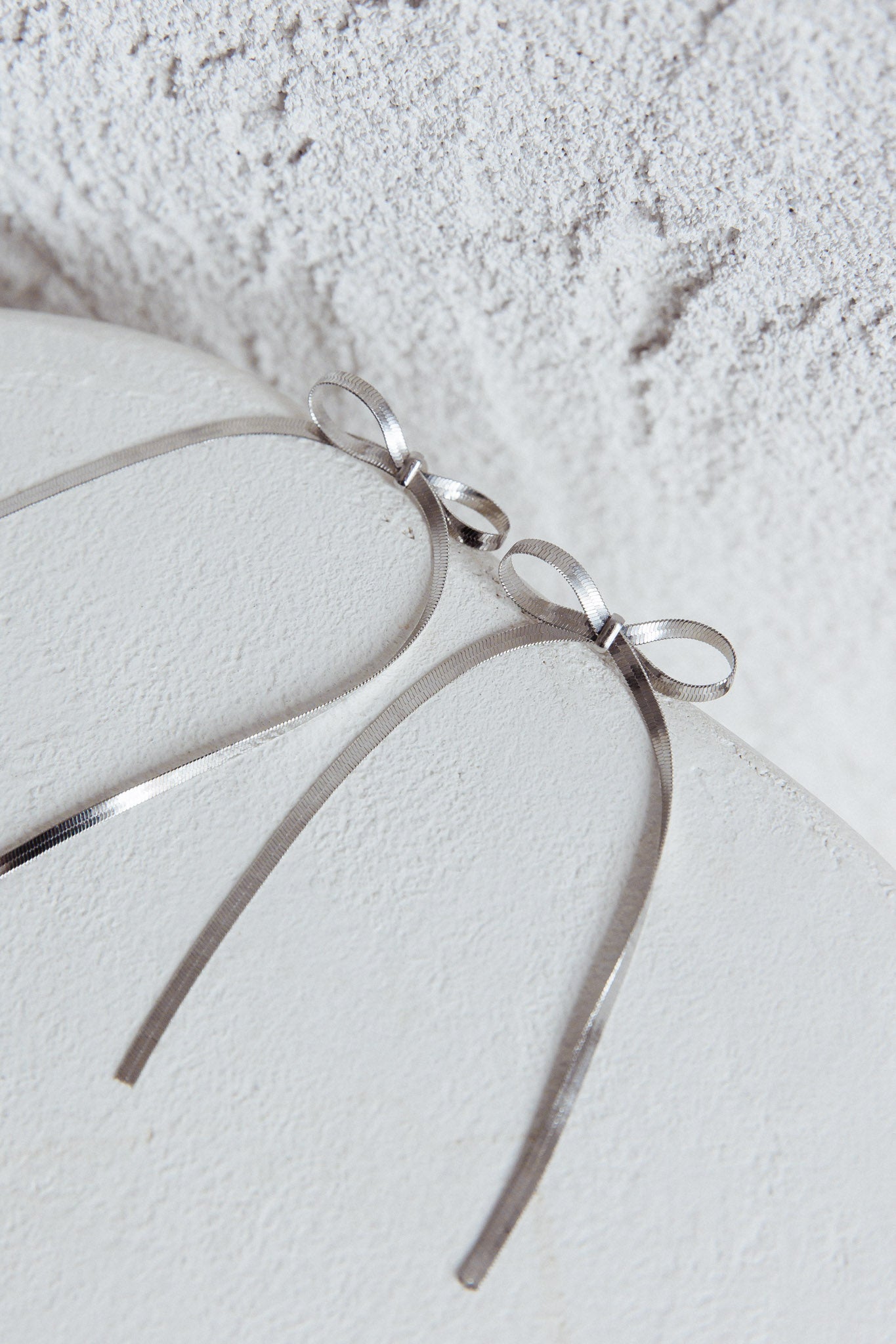 Silver earrings with chevron knot Macy